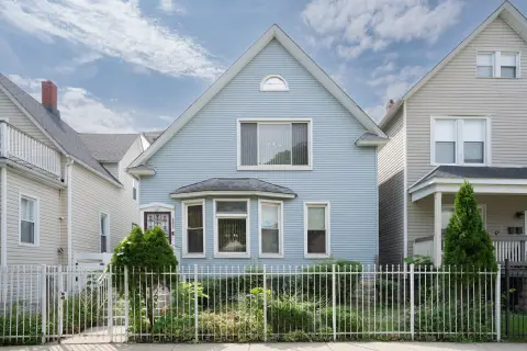 Duplex with Three-Car Garage