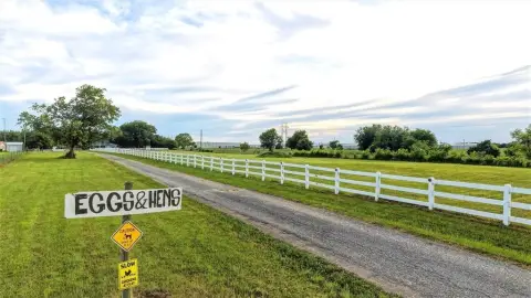 Updated Farmhouse on Fenced Acreage