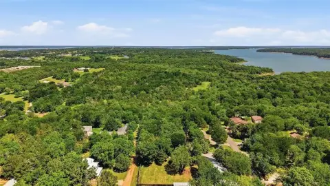 Heavily Wooded Land Near Lake