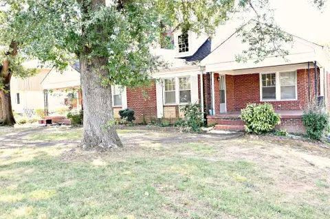 Brick Triplex with Rear Parking