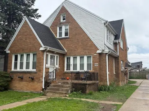 Brick Triplex with Three-Car Garage
