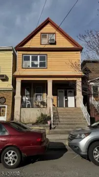 Bayonne Three-Family Home with Yard