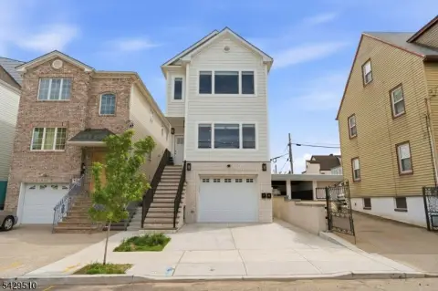 Upgraded Two-Family Home Near PATH