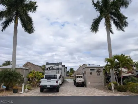 Paved Lake Lot with Tiki