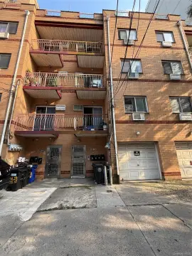 Brick Triplex with Off-Street Parking