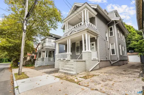 Six-Bedroom Duplex with Detached Garage