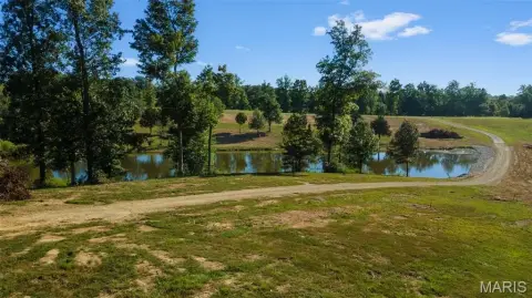Land with Pond and Utilities