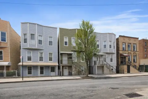Triplex With Finished Walk-Out Basement