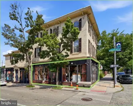 Corner Retail Space with Floor-to-Ceiling Windows