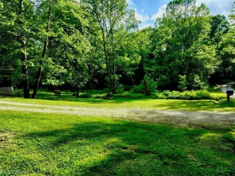 Wooded Land with Existing Mobile Home