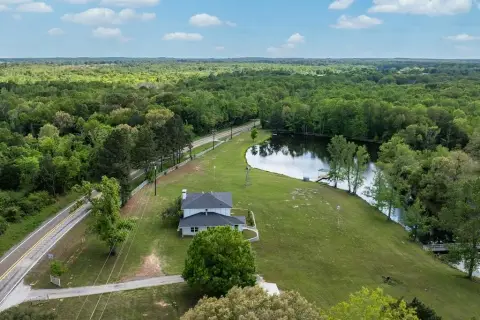 Updated Home with Acreage and Pond