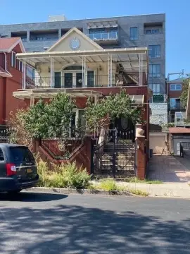 Detached Two-Family Home with Pool