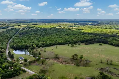 Updated Home with Acreage and Pond