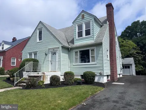 Cape Cod Duplex with Detached Garage