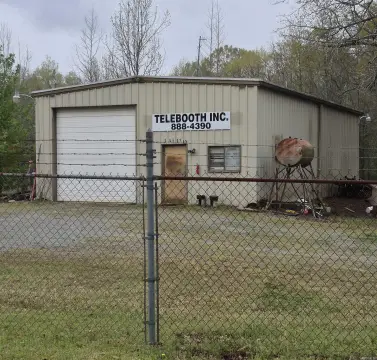 Fully Fenced Auto Shop with High-Ceiling Bay