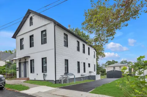 Two-Family Duplex with Dual Kitchens