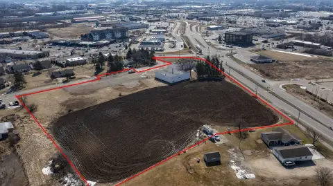 Commercial Land With Storage Sheds