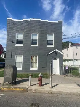 Renovated Brick Corner Quadplex