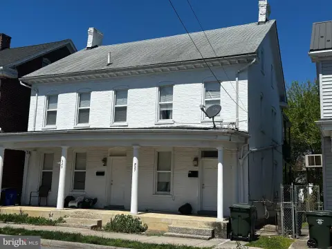 Brick Duplex with Detached Garages