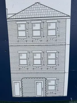 Brick Triplex Under Construction