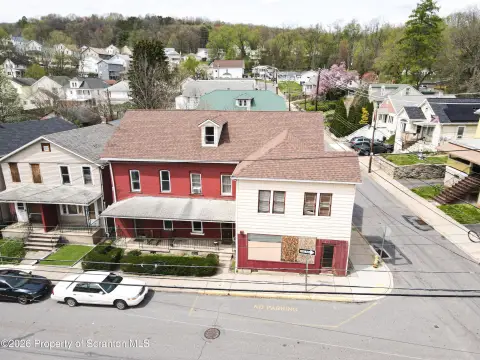 Four-Unit Residential and Retail Building