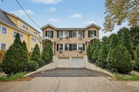 Two-Unit Brick Duplex with Garage