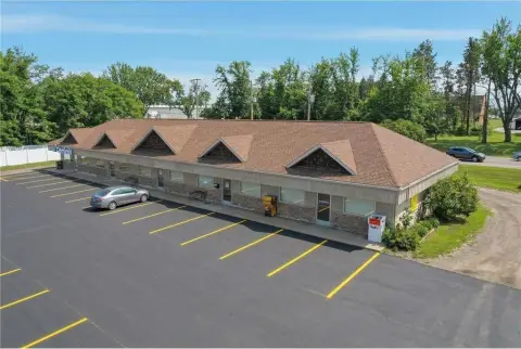 Strip Mall with Available Suite