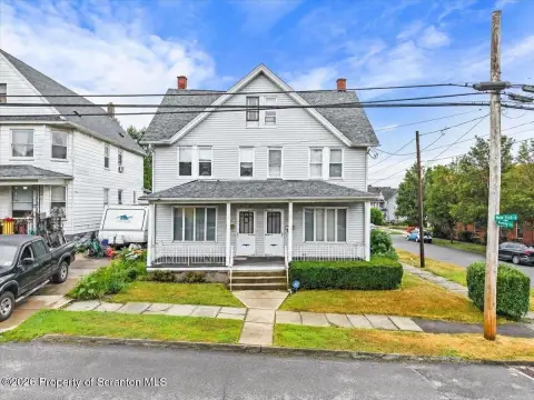 Corner-Lot Duplex With Separate Utilities