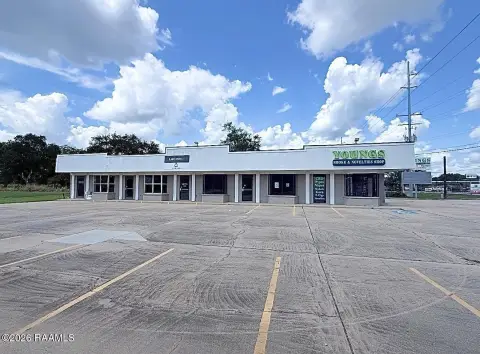 Storefront Retail Space with Pole Sign
