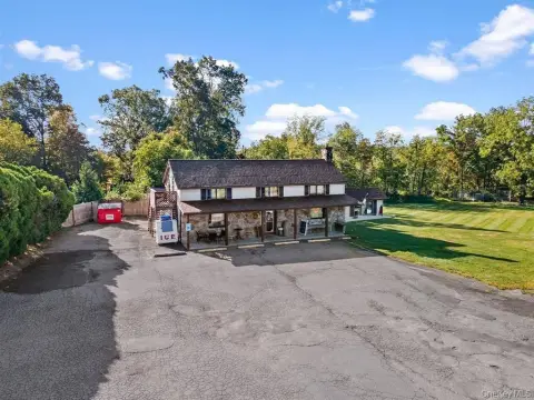 Deli, Store, and Apartment Building