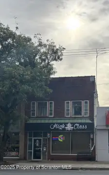 Turn-Key Barbershop with Apartments