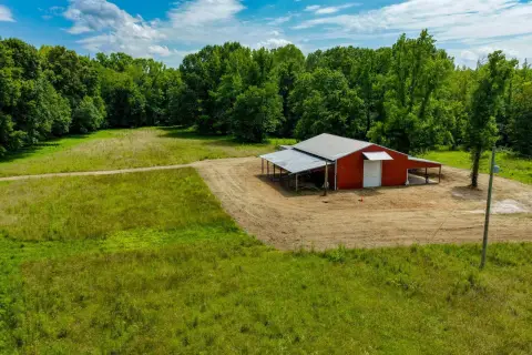 Pasture Land with Creek Frontage Barn