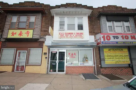 Retail Storefront with Second-Story Apartment
