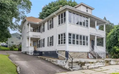 Duplex With Enclosed Porches