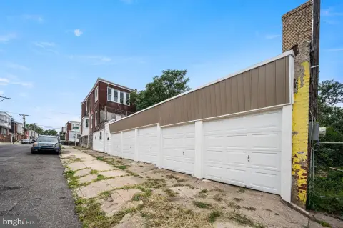 Triplex with Attached Garage/Warehouse