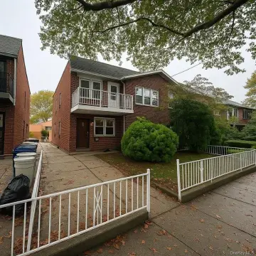 Brick Two-Family Home with Balconies