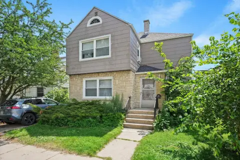 Two-Unit Duplex with Basement Additions