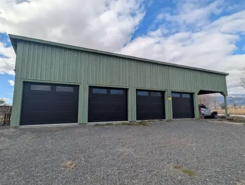 Fenced Acreage with 4-Bay Shop