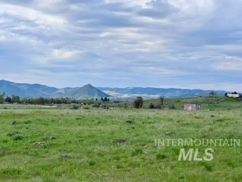 Country Acreage with Mountain Views