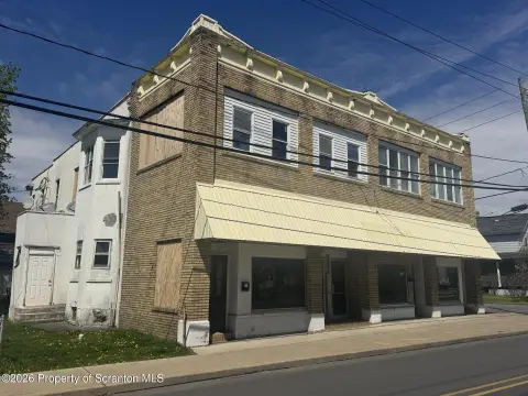 Corner-Lot Residential Income Duplex