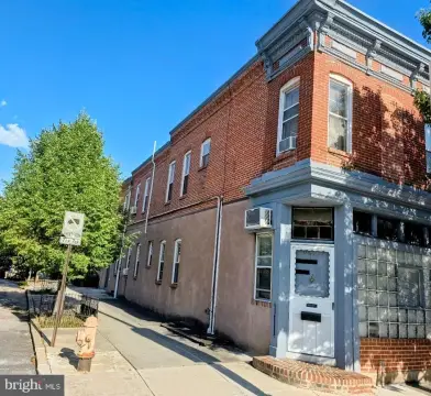 Corner Duplex with Exposed Brick