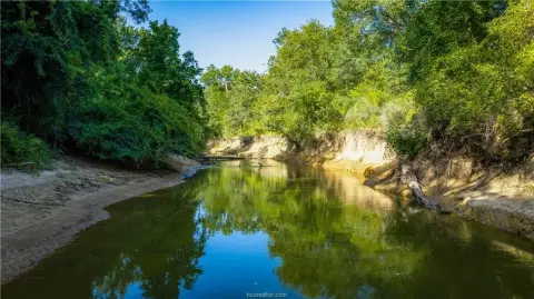 Riverfront Ranch with Hunting Cabin