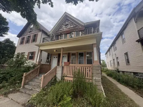 Updated Triplex With Rear Cottage