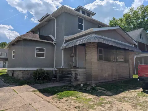 Three-Unit Triplex with Detached Garage Apartment
