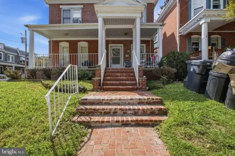 Brick Colonial Triplex