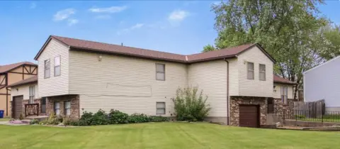 Owner-Occupied Duplex with Garages