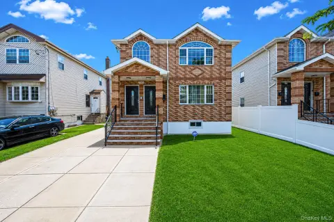 Modern Two-Family Residence with Income