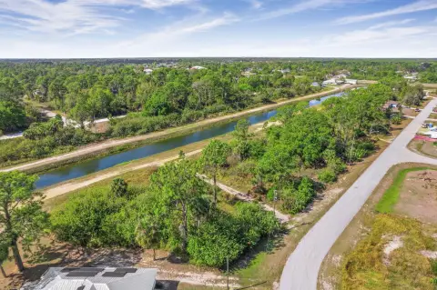 Oversized Canal-Front Lot Opportunity