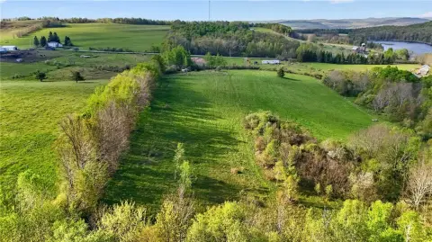 Land with Essential Improvements