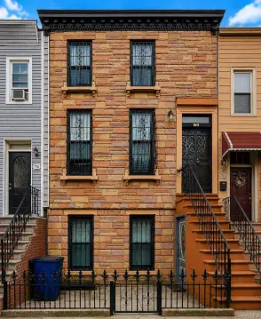 Vacant Two-Family Townhouse with Backyard